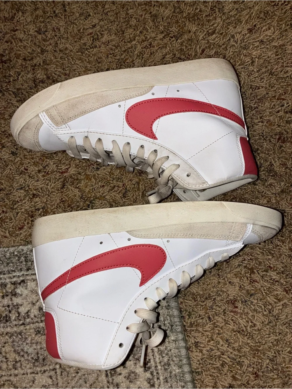 Nike Women's White High-Top Sneakers with Red Swoosh